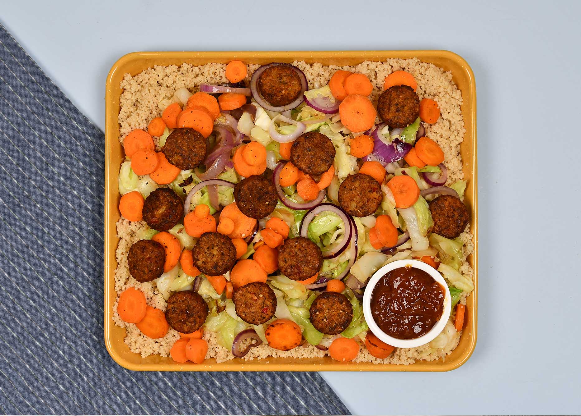 Couscous met spitskool, falafelburgertjes